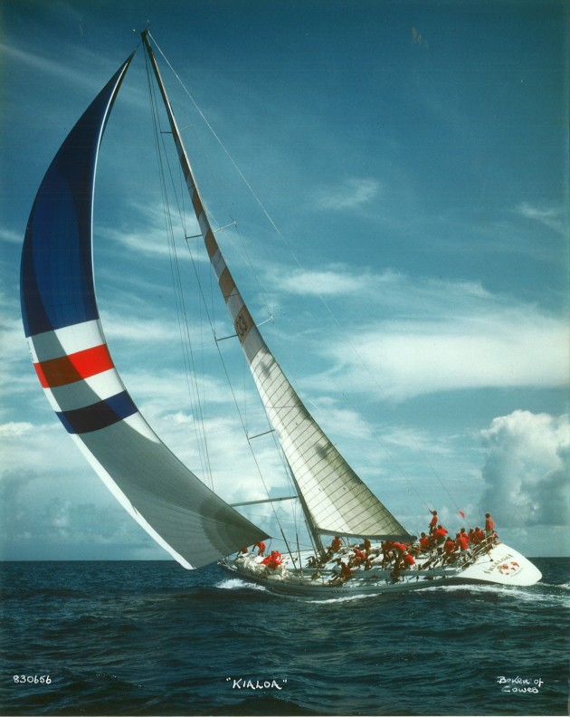 Hard pressed, Just look at the quarter wave! You don't see that in modern designs, thankfully. I think that is me at the mast, I would have just helped bounce the spin halyard and would have been putting the jockey pole up. This image is from Beken of Cowes.